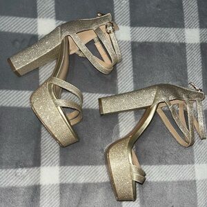 Gold high heels